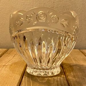 Crystal glass cup with roses engraved.